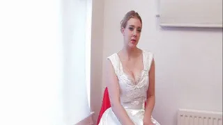 SSF Saphire bkue dressed in a satin wedding dress, fan blowing on her