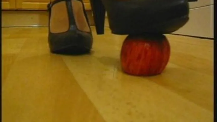 Crushes an apple with her heels BROADBAND