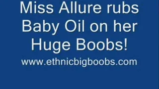 Miss Allure rubs Baby Oil on Huge Boobs!