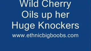 Wild Cherry rubs Baby Oil on her Big Boobs!