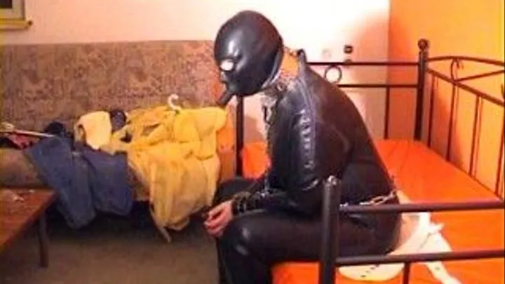 028-MI-Slavegirl locked in heavy rubber suit Part 2