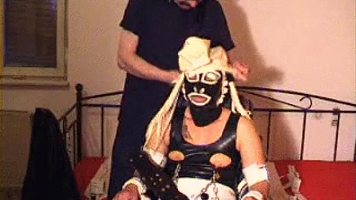 147-BI-rubber slave in mask and wheelchair2