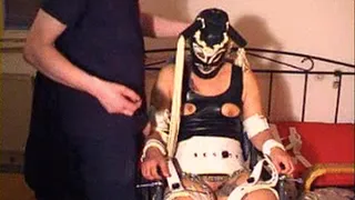 148-BI-rubber slave restrainted in wheelchair makes blowjob