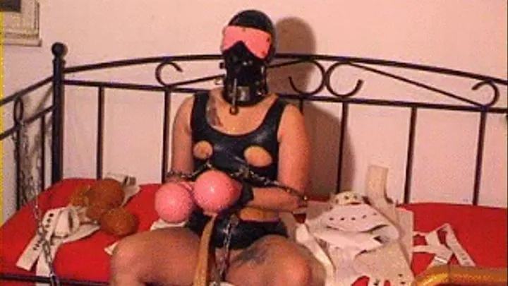 118-BI-female rubber slave in chains 3