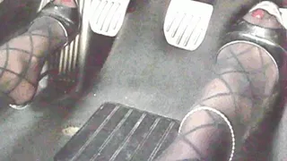driving in 4inch black mules and striped pantyhose