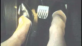 driving in 5inch metal-spike heels and nude stockings part1