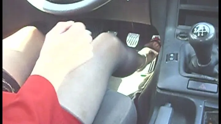 she is driving in black pantyhose on the motorway part2