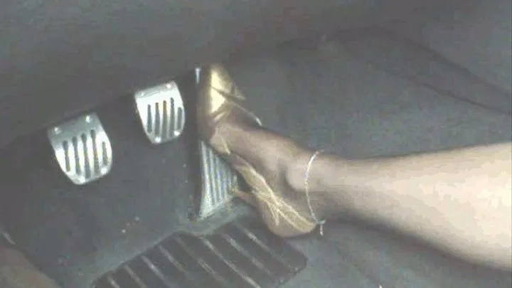 she is driving in her 4inch gold/brown high heel pumps part1