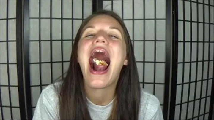 Remmi's open mouth pizza eating