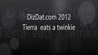 Tierra Ferrari eats a twinkie