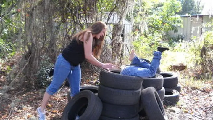 Brittney stuffed in tires