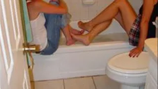 Room mates soak their feet