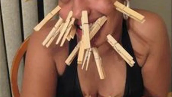 Neici plays with clothes pins