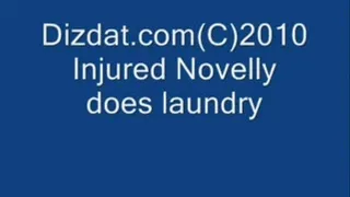 Injured Novelly does laundry