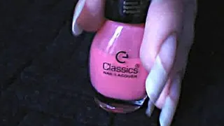 Finger Nail Polishing into the pink color