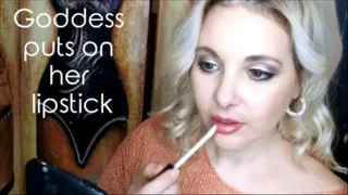 Goddess puts on her lipstick