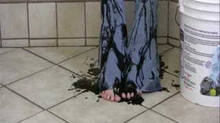 Feet in Dirty Black Oil