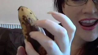 Destroying a banana with long natural nails!