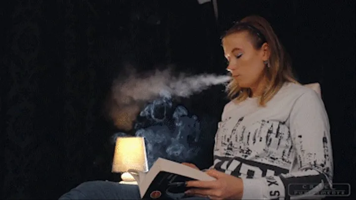 Anette reading and smoking