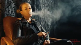 Smoking in a leather jacket