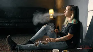 Ripped jeans and cigarette