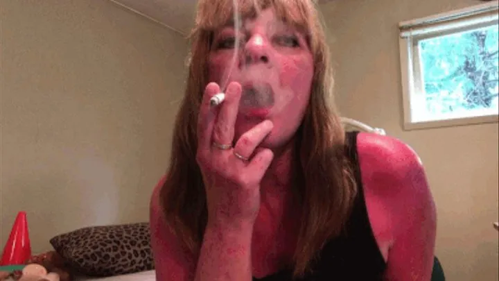 Sexy red mouth sultry smoking