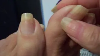 CANDI RUBS HER TOES, SOLES AND HEELS OF HER FEET WHILE WIGGLEING HER TOES WITH HER HANDS...VERY SEXY CLIP! ..