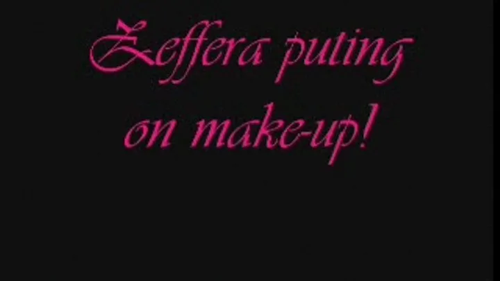 Zeffera putting make-up on