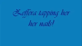 Zeffera tapping her finger nails 3gp