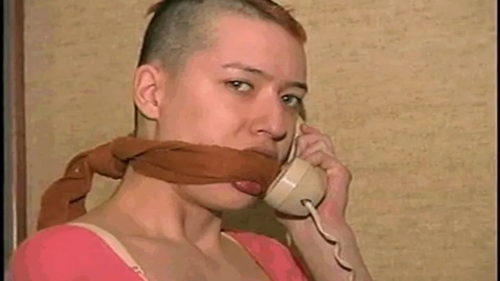 PUNK GIRL IS BAREFOOT,MOUTH STUFFED, CLEAVE GAGGED, TOE-TIED & TRIES TO MAKE PHONE CALL