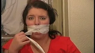 25 YEAR OLD DAY CARE WORKER GETS HER MOUTH STUFFED, HANDGAGGED, WRAP BONDAGE TAPE GAGGED, BAREFOOT, TOE-TIED, ANGRY GAG TALKING AND WEARING ROLLED UP BLUE JEANS