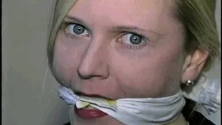 27 YEAR OLD HOUSEWIFE GETS HANDGAGGED, MOUTH STUFFED, CLEAVE GAGGED AND TIGHTLY TIED TO A CHAIR