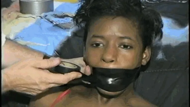 22 YR OLD STUDENT IS WRAP TAPE GAGGED & BOUND UP WITH BLACK ELECTRICAL TAPE