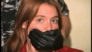 24 Yr OLD CRAFTIER IS MOUTH STUFFED, DUCT TAPE GAGGED, CLEAVE GAGGED, WRISTS GAGGED, SELF WRISTS GAGGING, BLACK LEATHER GLOVE HANDGAGGED, SELF MOUTH STUFFING AND HANDGAGGING