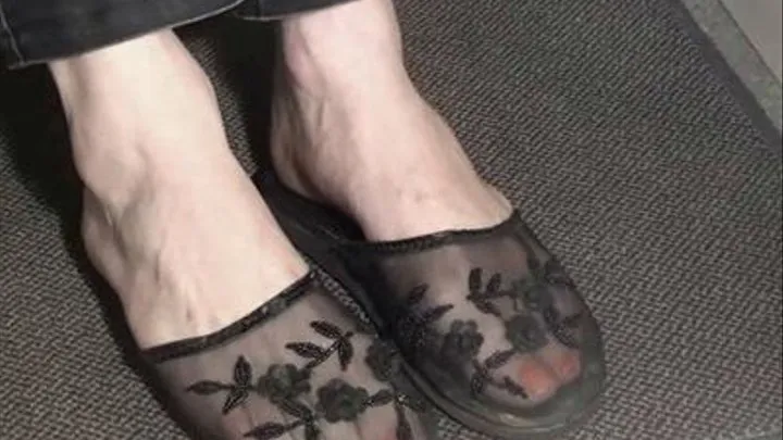 Cathy toes in transparent mules!