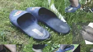 trashed slippers in the grass