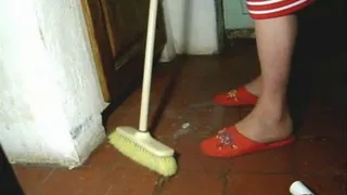 cleaning home in chinese slippers