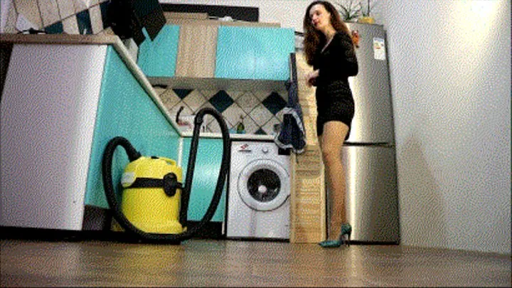 Wife after work vacuuming her legs