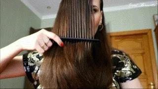Brushing brunette straight hair.