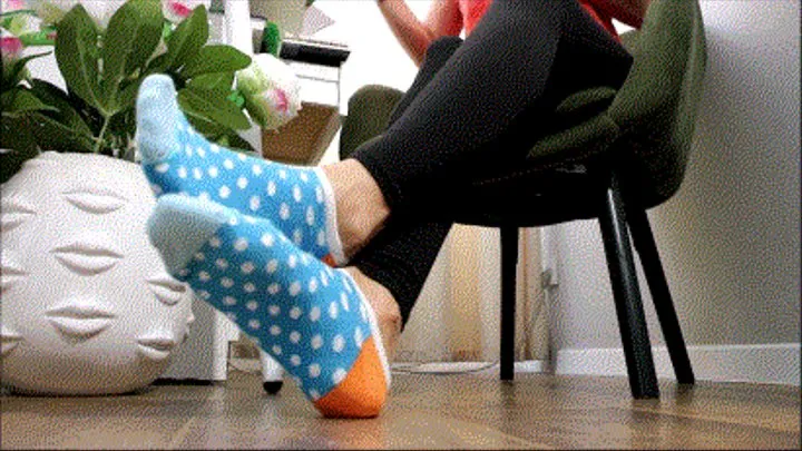 Feet play in blue socks