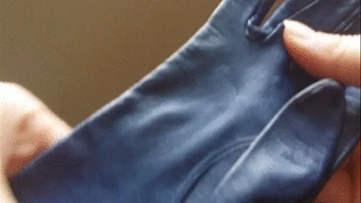 Black leather gloves closeups