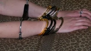 Andi - Handcuffs Herself with Multiple Pairs of Cuffs