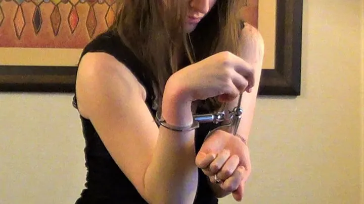 Monica - Locked in Chinese Handcuffs