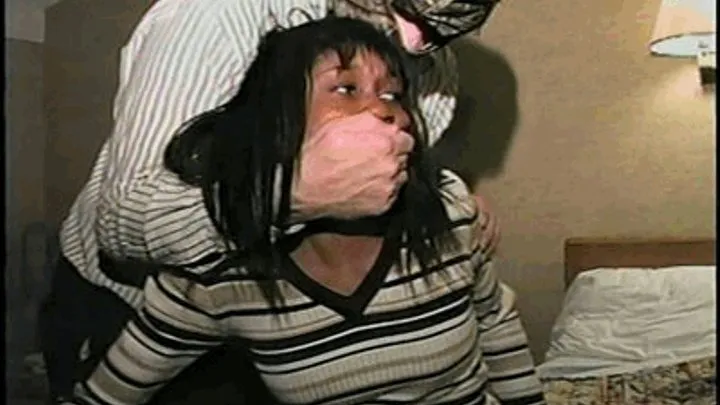 FEISTY & CUTE CAB DRIVER IS TAPE GAGGED, MOUTH STUFFED, TIED WITH RAWHIDE & TIGHTLY HANDGAGGED