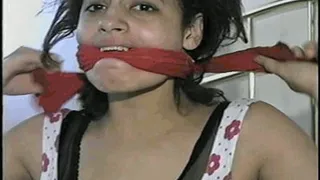 18 Yr OLD LATINA TAPES UP, STUFFS HER MOUTH, CLEAVE GAGS, & HANDCUFFS HERSELF TO A BRASS BED.