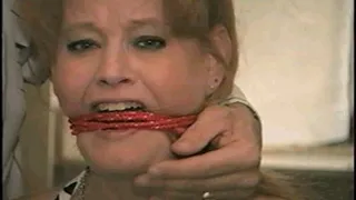 41 Yr OLD RED HEADED FAMOUS FASHION MODEL GETS HANDGAGGED, MOUTH STUFFED, CLEAVE GAGGED, BALL-GAGGED AND HIGH HEEL SMELLING