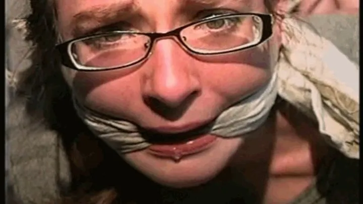 25 Yr OLD NEWS PAPER REPORTER IS MOUTH STUFFED, CLEAVE & HANDGAGGED WEARING EYE GLASSES, BAREFOOT, TOE-TIED AND HOG-TIED WHILE LAYING ON THE FLOOR