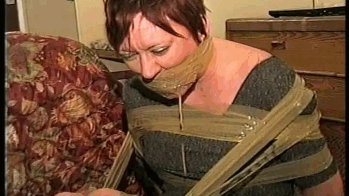 37 YR OLD TAVERN OWNER GETS BALL-TIED WITH TAPE, HANDGAGGED, MOUTH STUFFED WITH SWEATY STINKY STOCKING, WRAP TAPE GAGGED, TO SMELL STINKY NYLON STOCKING & TROUGHS UP THROUGH HER GAG