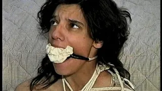 26 Yr OLD K-MART CLERK IS RING-GAGGED, BALL-TIED, IS RING GAGGED, MOUTH STUFFED, BIKINI TOP GAGGED, BALL-GAGGED, ACE BANDAGE GAGGED, BLINDFOLDED, TOE-TIED & DROOLING WHILE SITTING BALL-TIED AND NAKED ON THE FLOOR