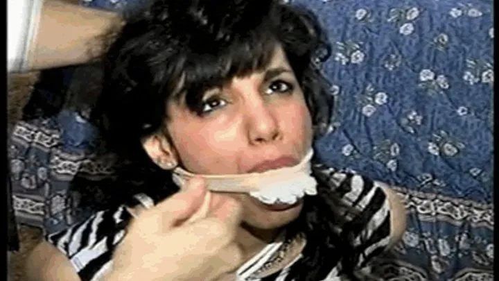 35 YEAR OLD ITALIAN HAIRDRESSER IS MOUTH STUFFED, HANDGAGGED, WRAP ACE BANDAGE GAGGED, BALL-TIED, HOG-TIED, DUCT TAPE GAGGED WHILE LAYING ON THE FLOOR